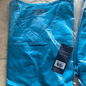 Brand new M Cherokee Scrubs set in turquoise.